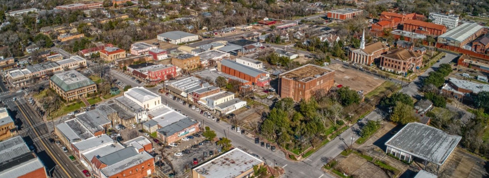 An aerial view of a city with many buildings.